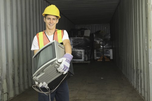 Professional garage clearance team at work